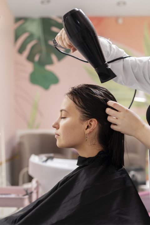 woman-getting-treatment-hairdresser-shop (Small)
